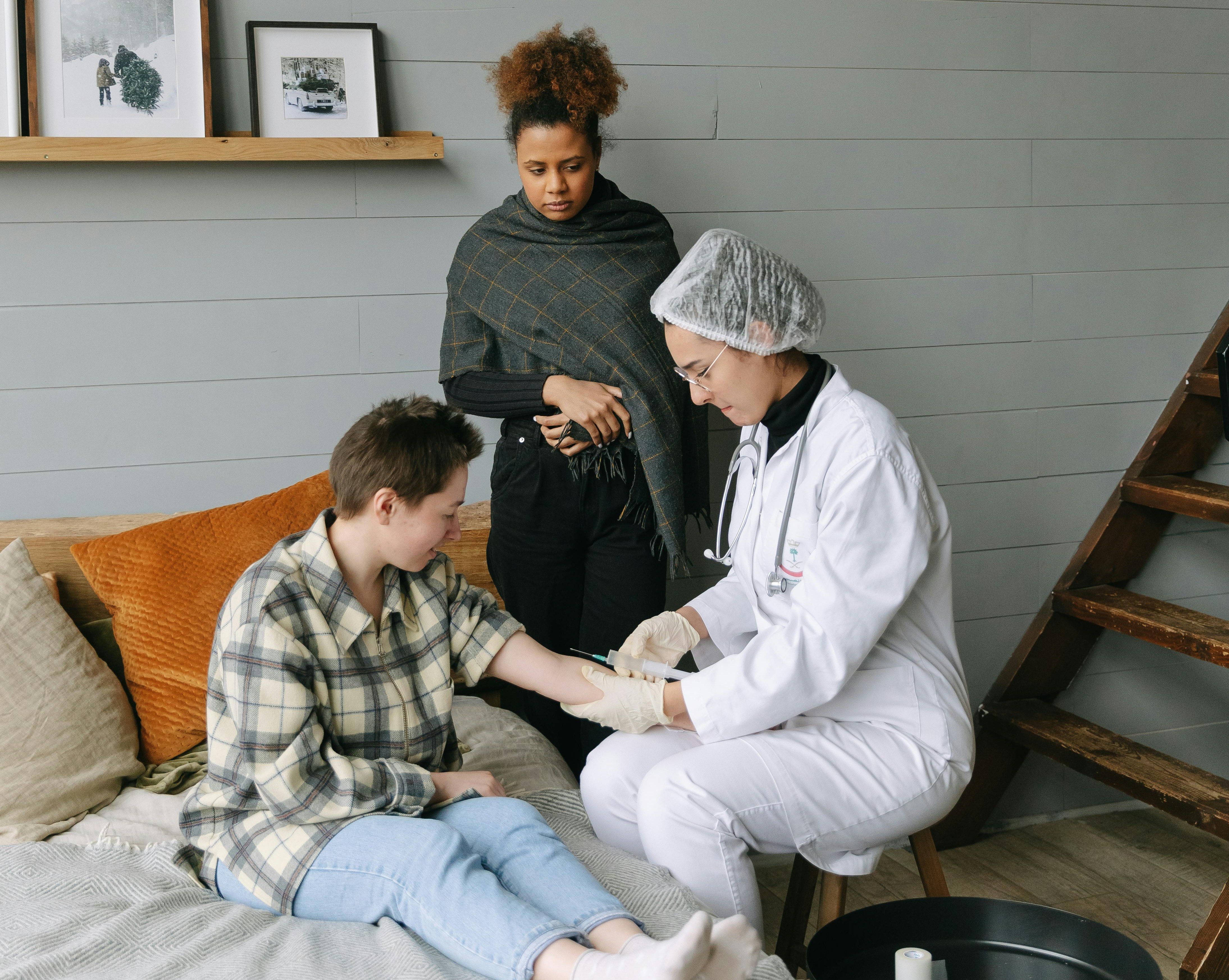 Nurse helping a patient to stretch