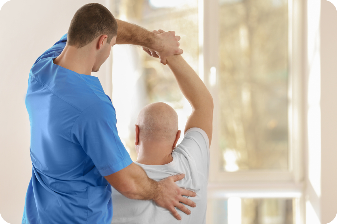 Nurse helping a patient to stretch