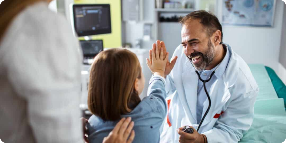 Doctor doing a high-five with a child