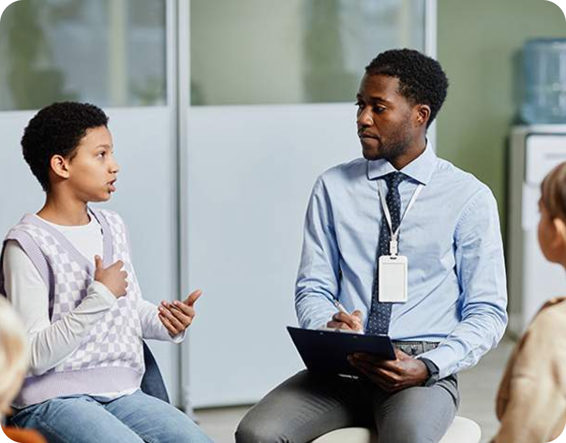 man listening to a young girl talking