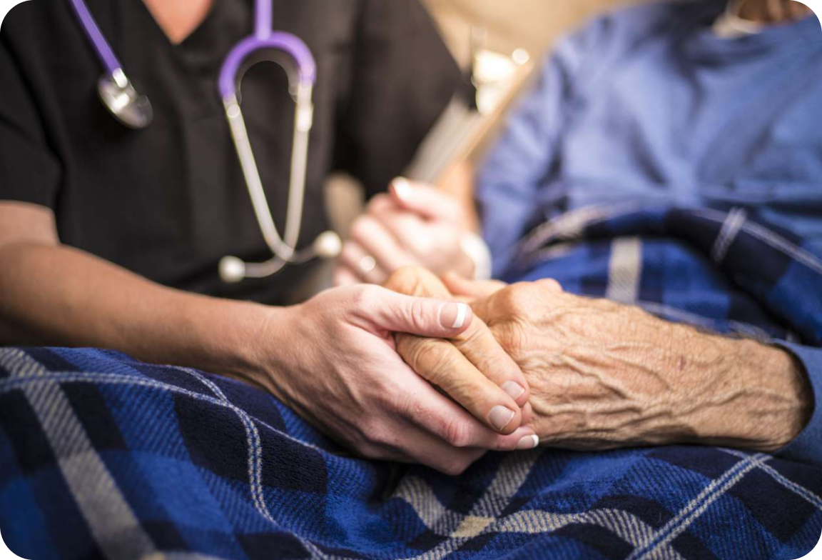 Doctor holding a hold man hand